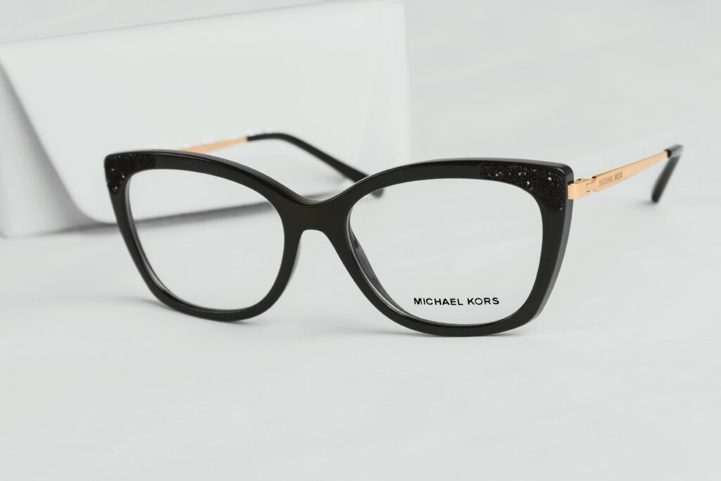 Chic black cat eye eyeglasses by Michael Kors with luxurious design accents.